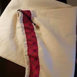 Tory Burch Lowell coconut leather riding boot logo